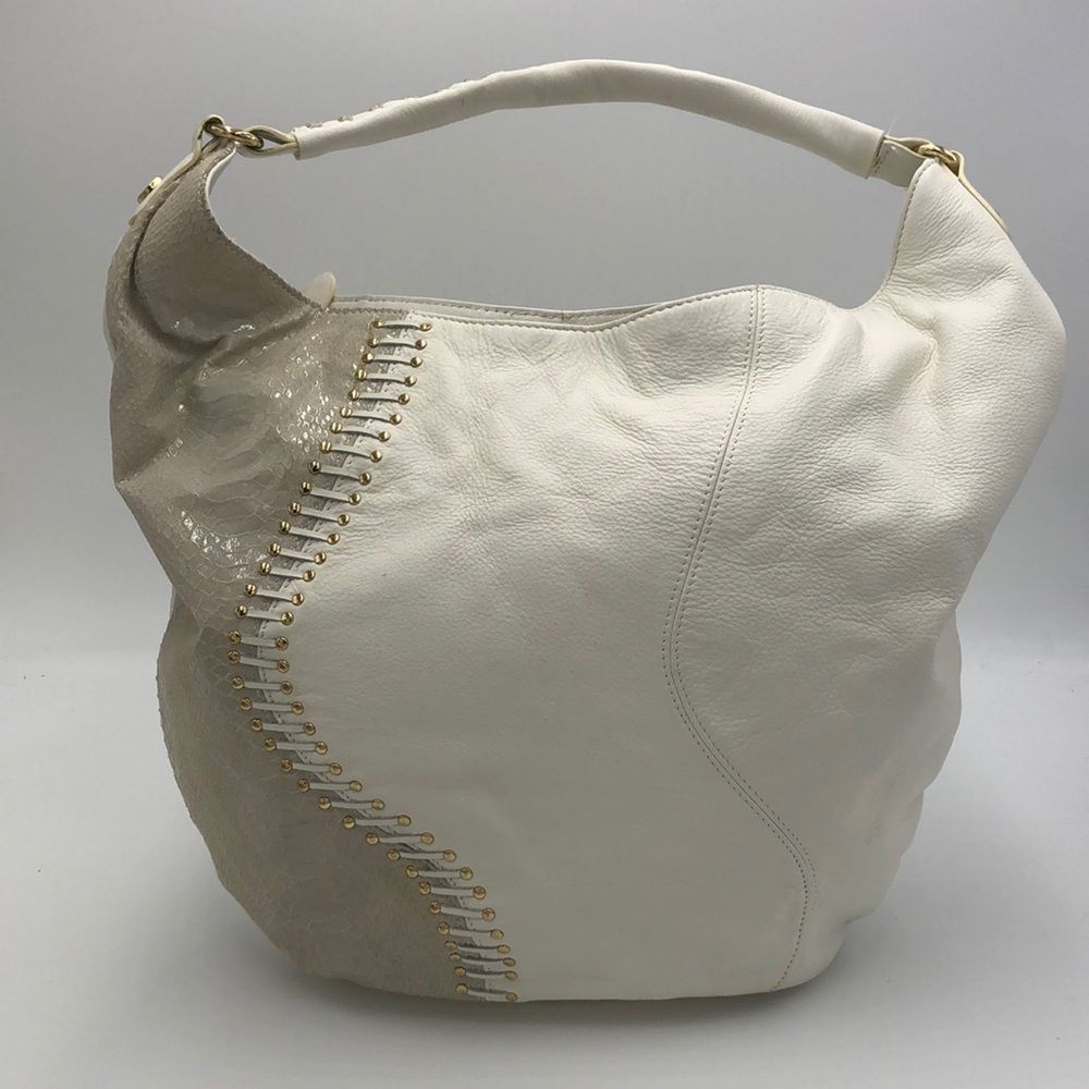 Like New Carlos Falchi hobo bag. White leather and faux snake skin/gold accents